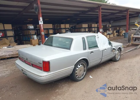 1997 Lincoln Town Car Executive из США, поврежденный, VIN 1LNLM81W8VY669978